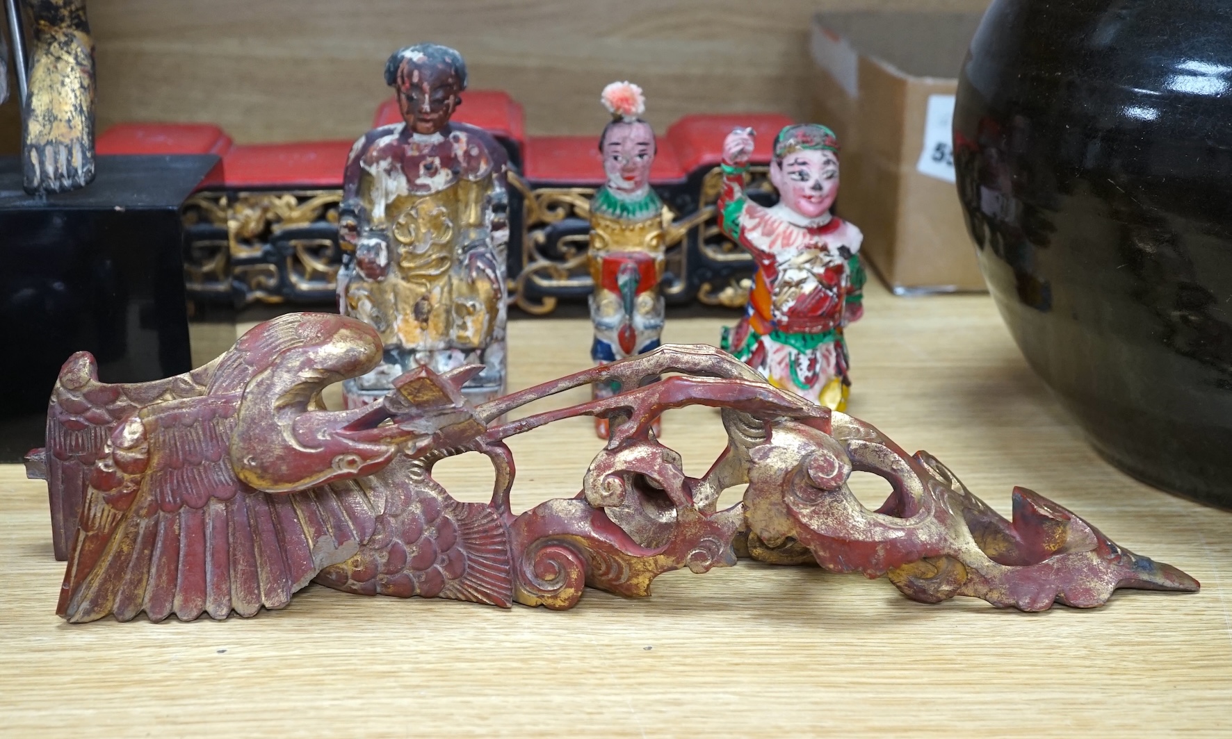 A carved painted South East Asian figure on stand, lacquered wood figures and carvings and a carved frog box, painted figure 50cm high. Condition - mixed, poor to fair